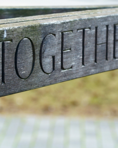 Word Together etched in wood, used to show learning together during workshops