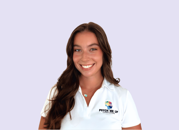 Natalie Gurnett, Psych Me Up Consulting, mindset performance coaching for athletics and academics-image of woman with brown hair and white tee shirt